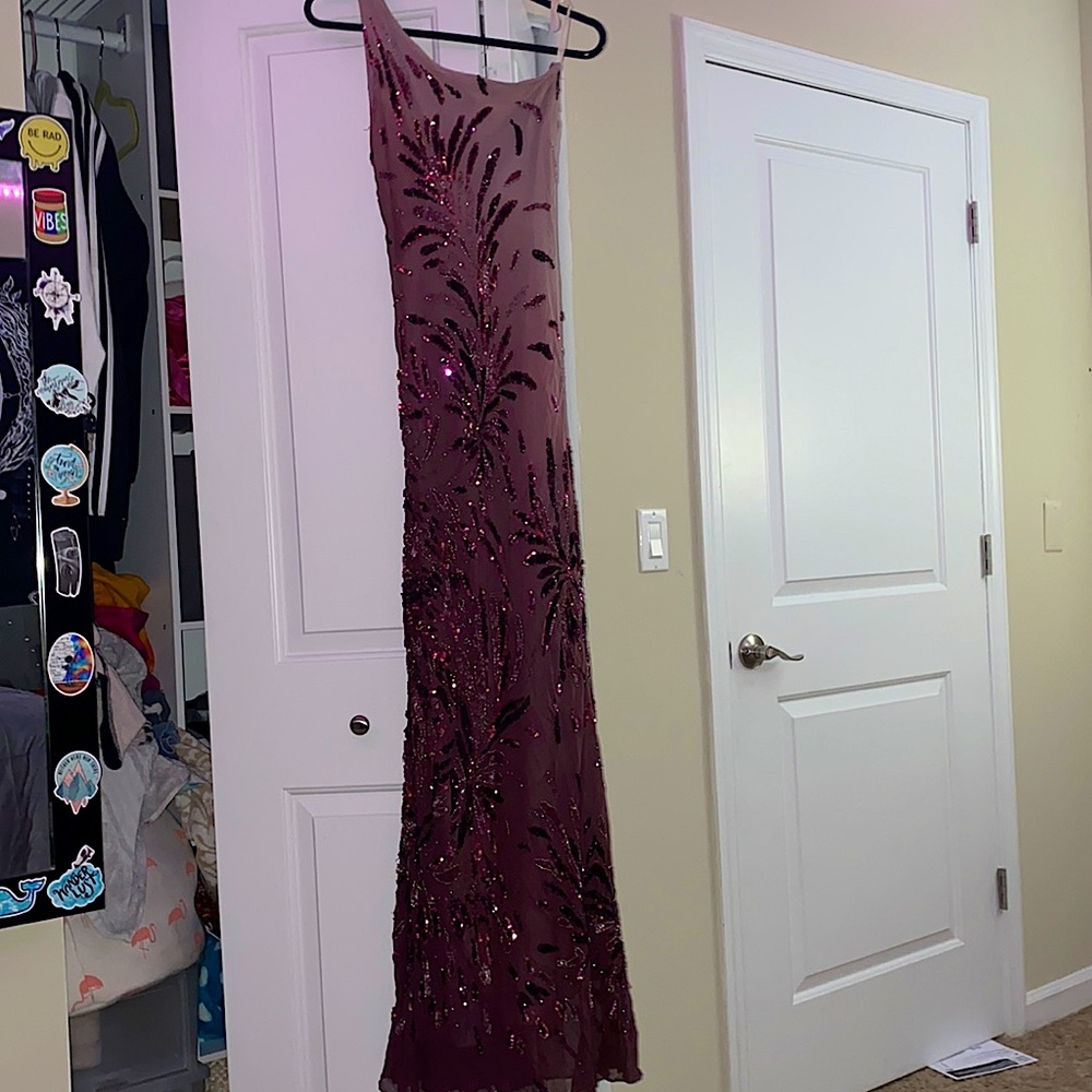a purple size 8 skin tight dress